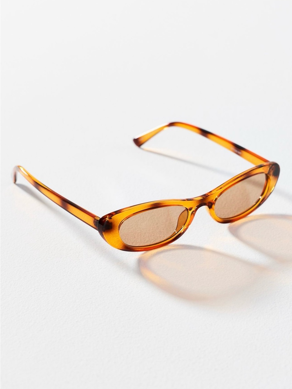 Anthropologie Amber Tortoise  eyeking slim east - west Oval Sunglasses